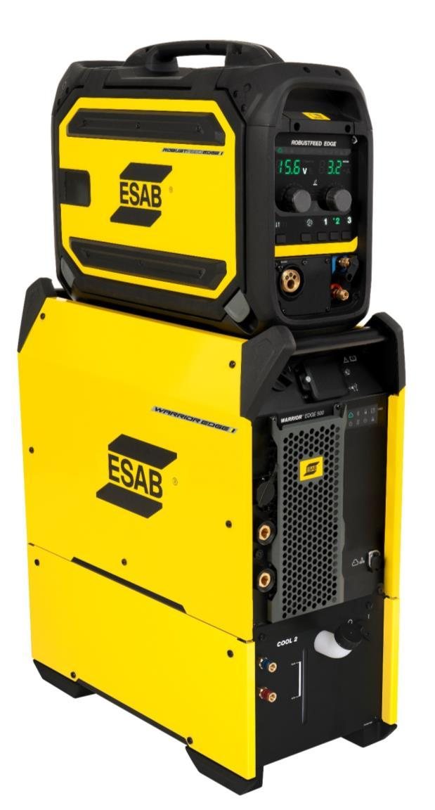 ESAB Warrior Edge 500 CX power source on a trolley with the Cool 2 cooling unit, and a RobustFeed Edge CX wire feeder mounted on top showing 15.6 V and 3.2 m/min on its display